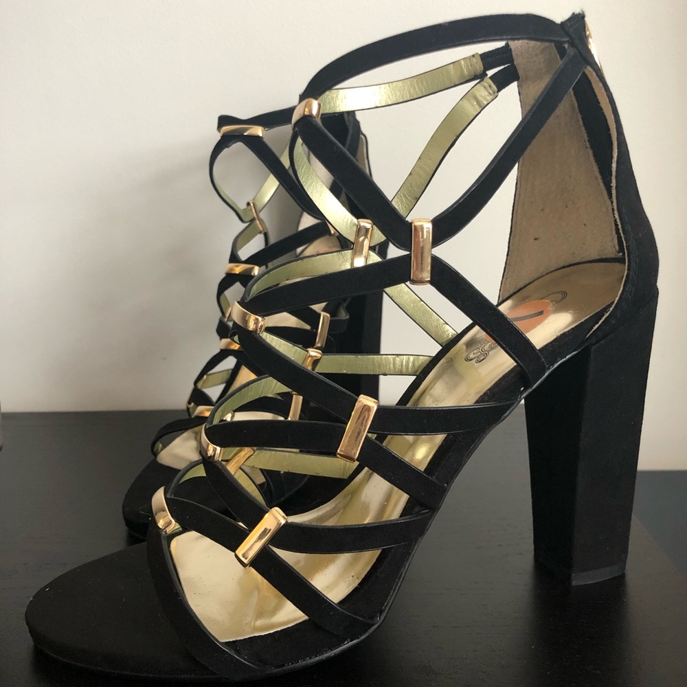 Black and gold high heels
